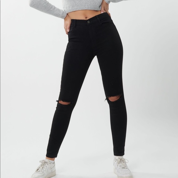 Garage jeans with rips in the knees